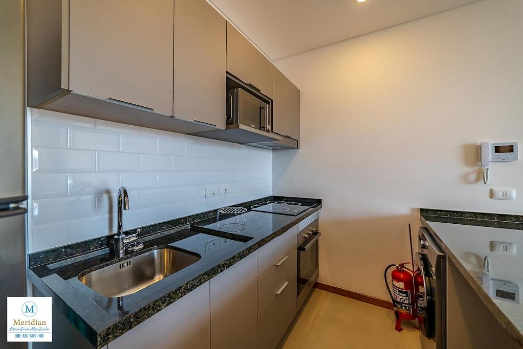 506 Emerald Steps away from Shopping del Sol! High Speed WiFi