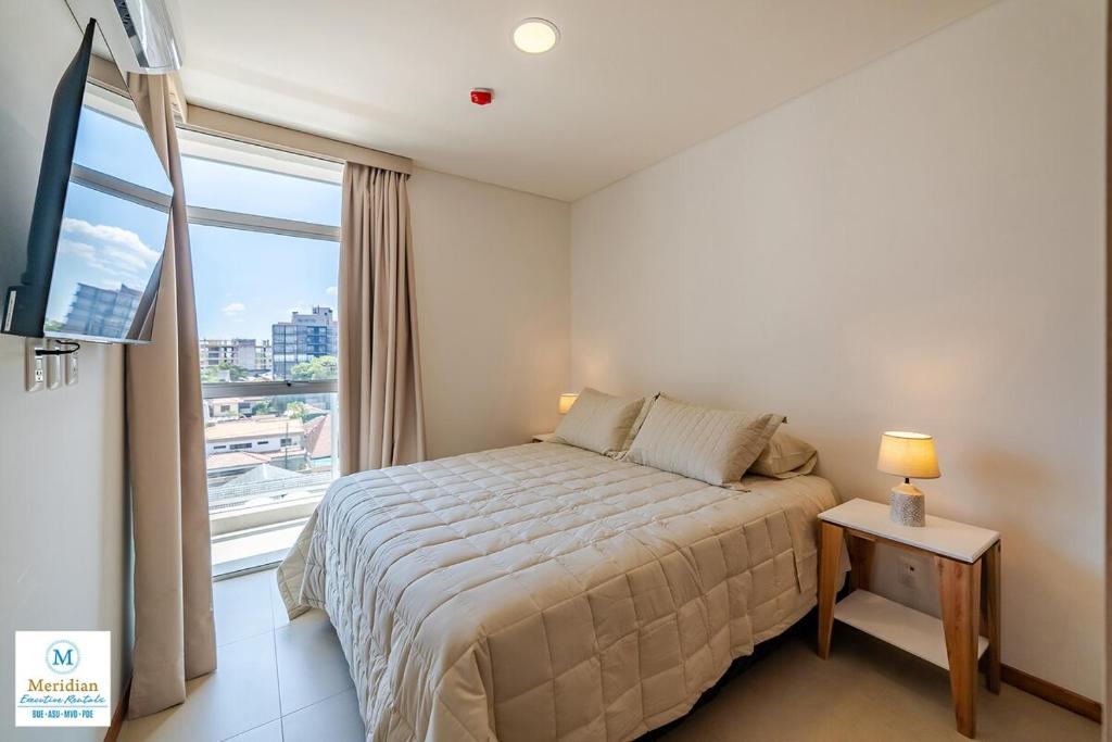 506 Emerald Steps away from Shopping del Sol! High Speed WiFi